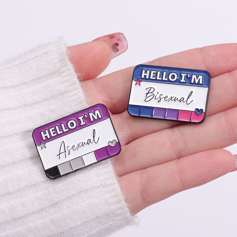 Queer and Here Pins